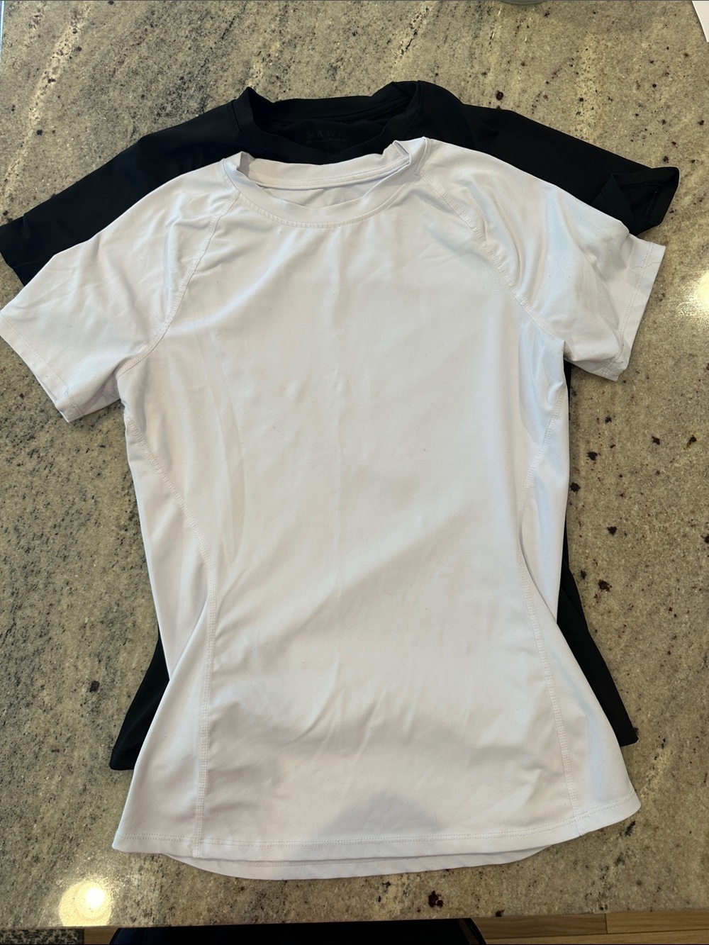 Two Woman’s Compression T shirts